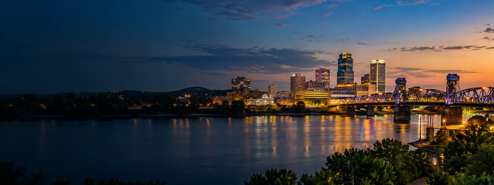 Little Rock lights on the river at dusk