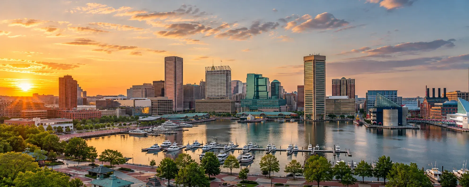 Baltimore Inner Harbor skyline at sunset, where DevSolutionsAI provides AI services in Baltimore
