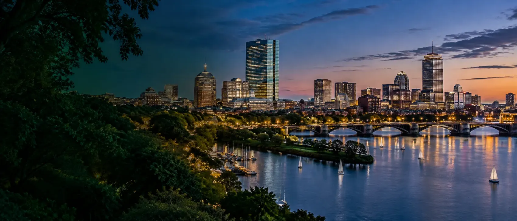 Boston skyline over the water at night