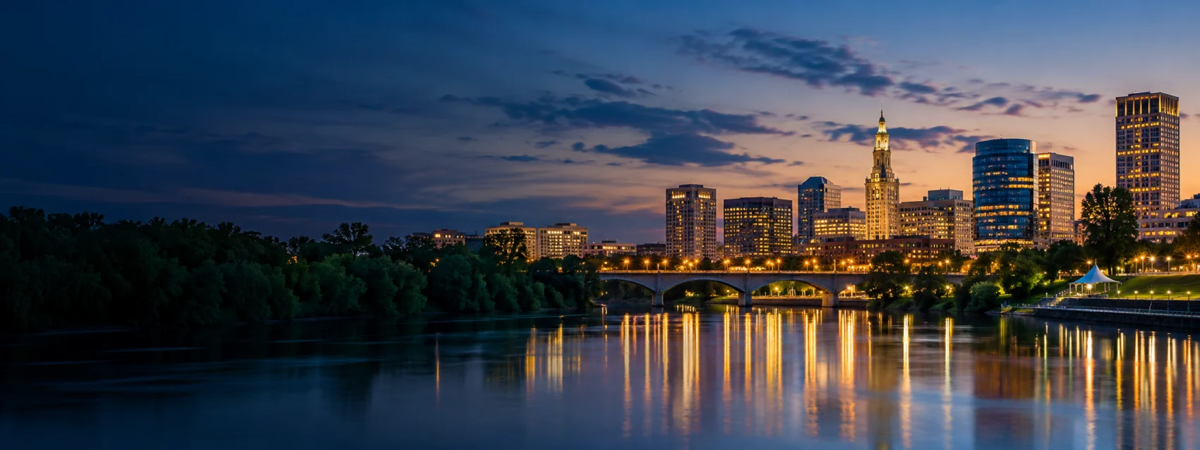 Connecticut city lights on the water at dusk