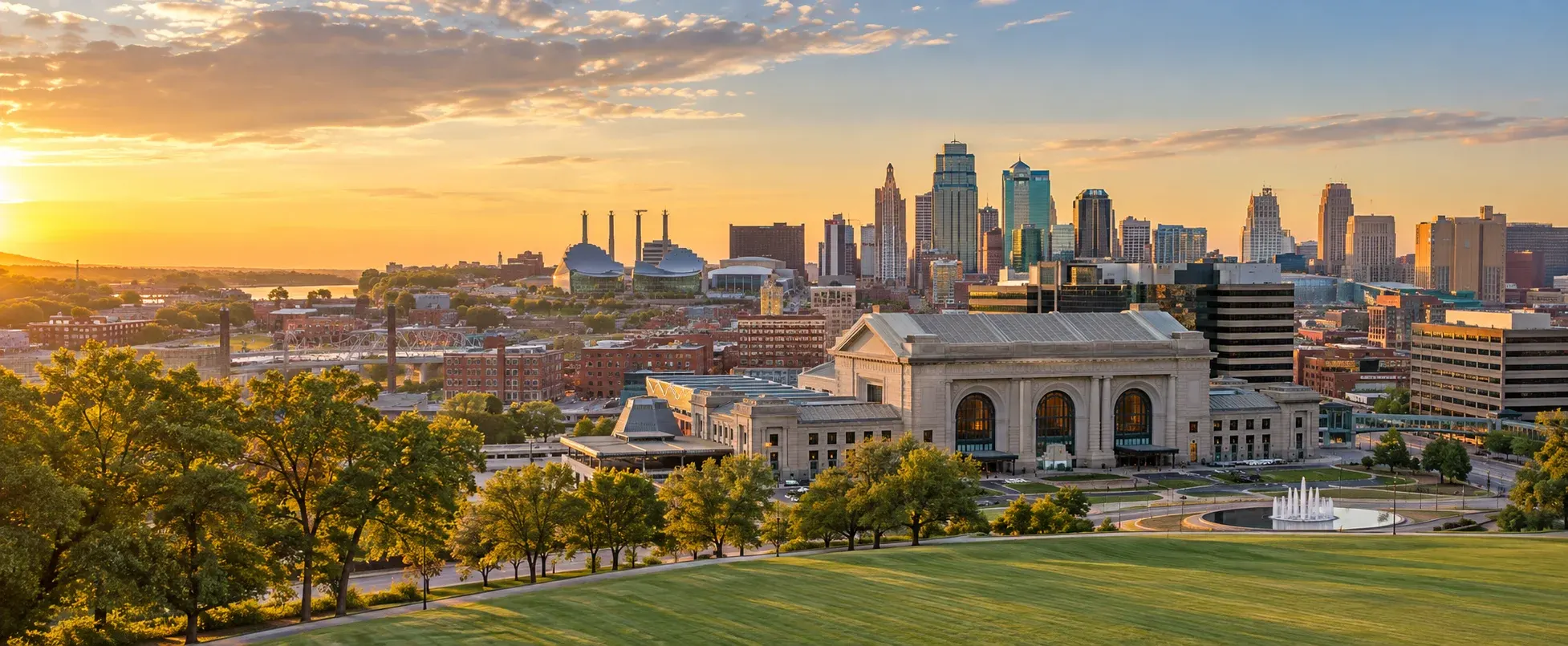 Kansas City skyline and Union Station at sunset, where DevSolutionsAI provides AI services in Kansas City