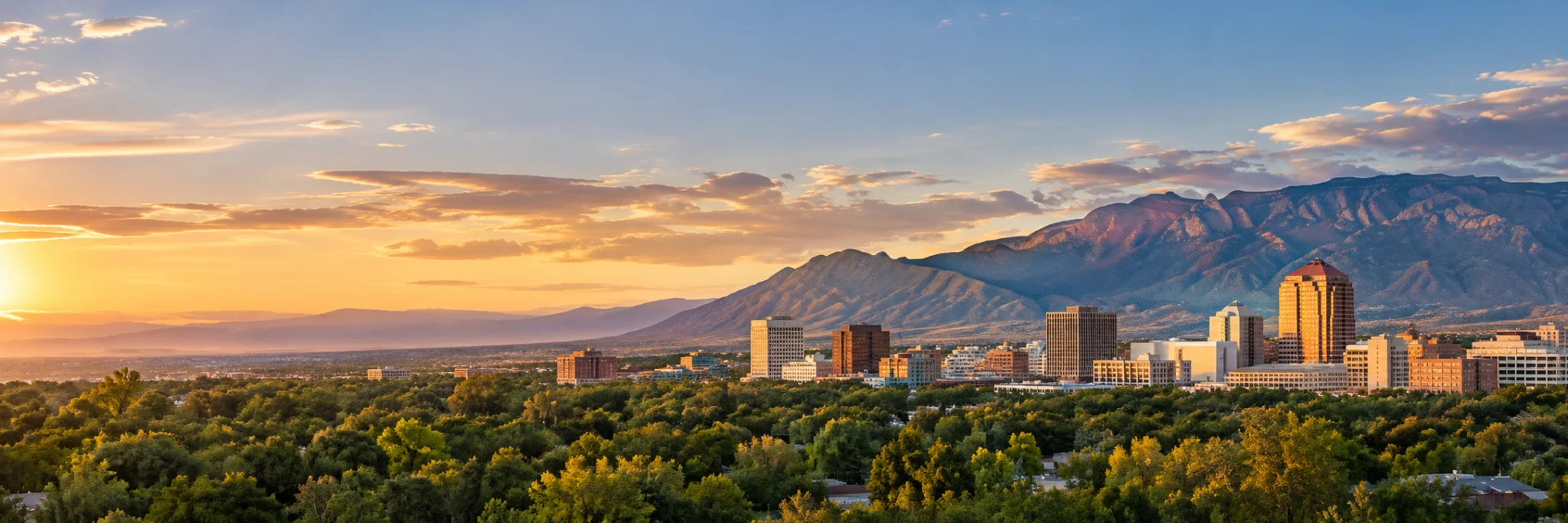 Albuquerque below the Sandia Mountains at sunset, where DevSolutionsAI provides AI services in New Mexico