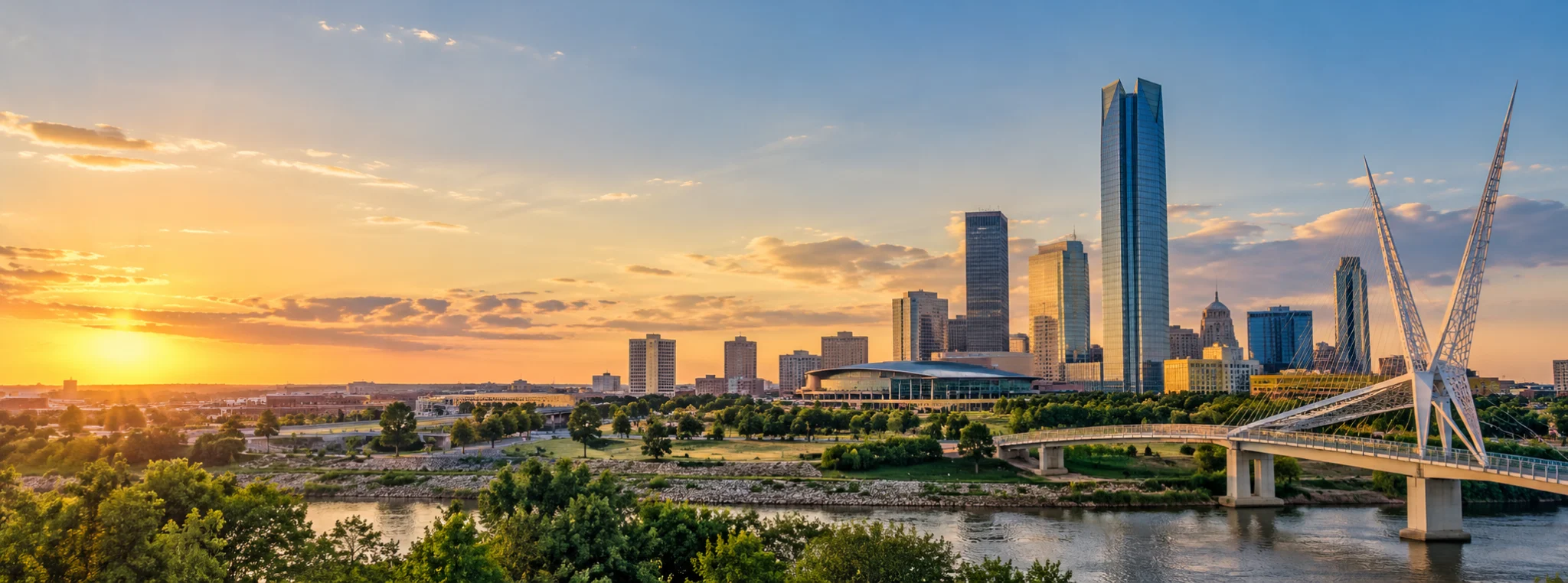 Oklahoma City skyline and river bridge at sunset, where DevSolutionsAI provides AI services in Oklahoma