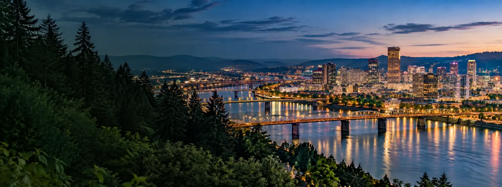Oregon city lights at dusk along the river