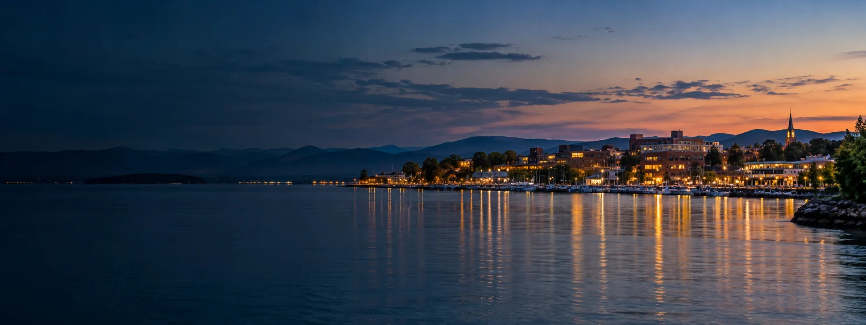 Burlington lights on Lake Champlain at dusk