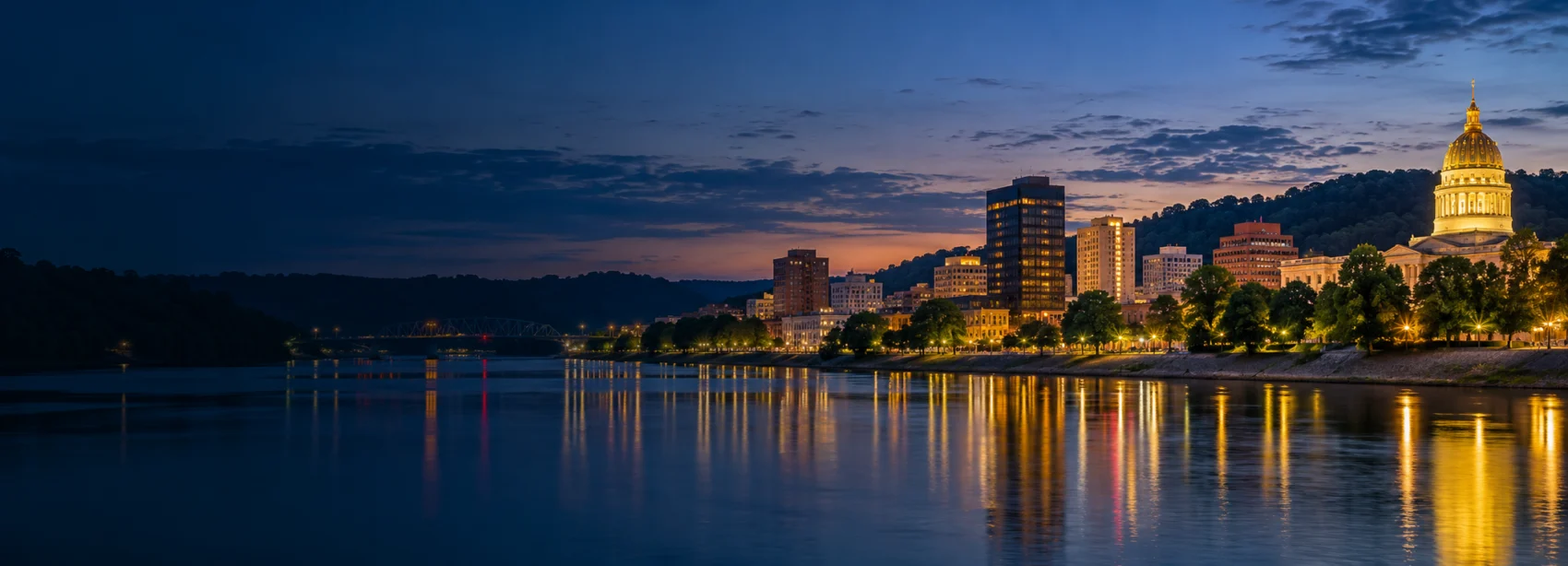 Charleston lights along the river at dusk